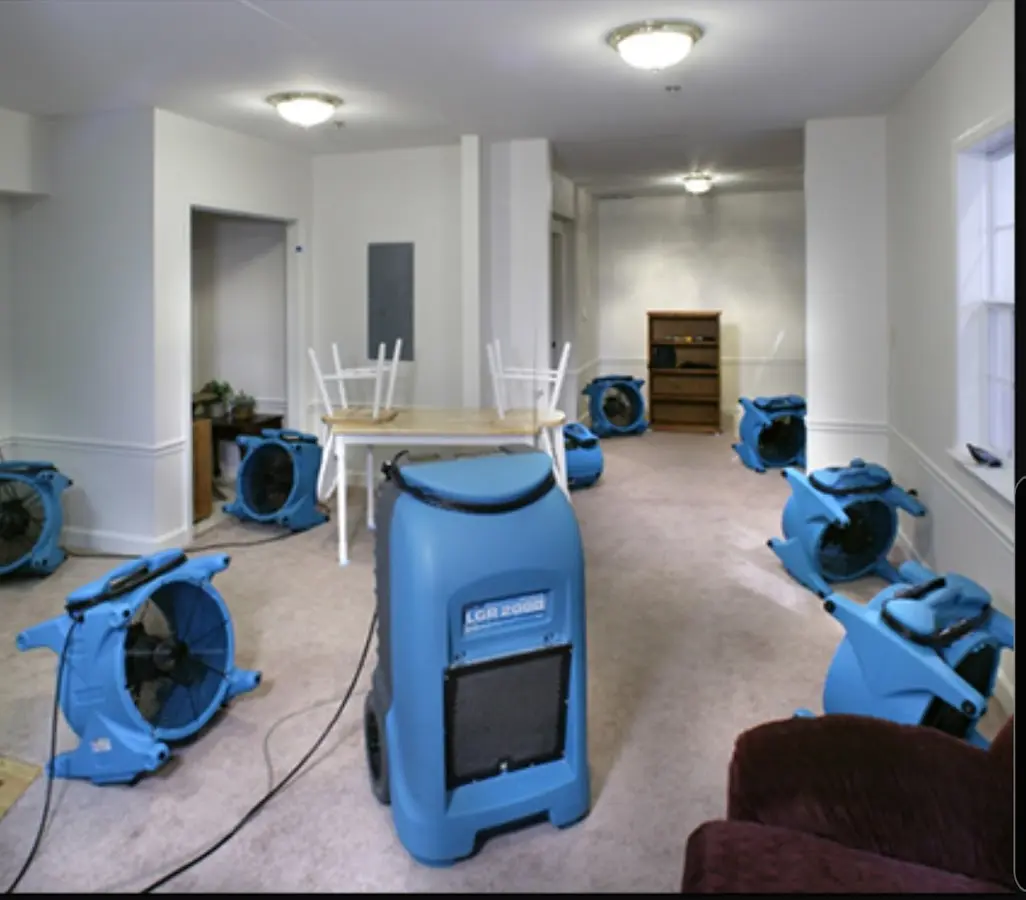 Air movers and dehumidifier setup for Water Damage Restoration in Morris